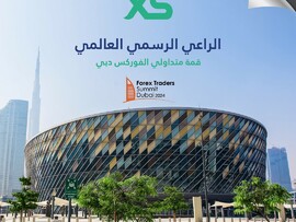 "إكس أس" في صدارة  "قمة المتداولين" في دبي 