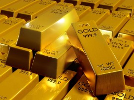 الذهب يواصل خسائره مع ارتفاع  الدولار وخفض الفائدة الأميركية